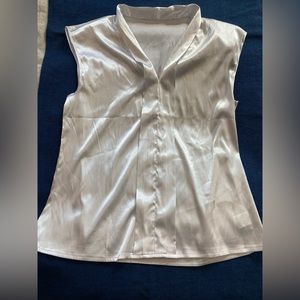 2 white blouses and some white pants.